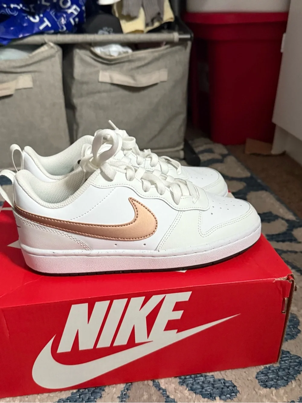 Nike Kids White Sneakers with Metallic Rose Swoosh